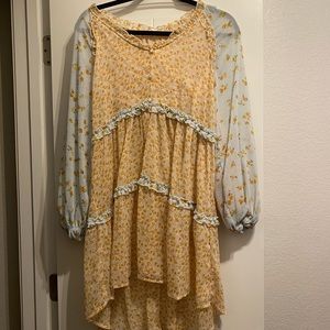 cute and light high low dress from a boutique. brand is blu pepper. worn handful